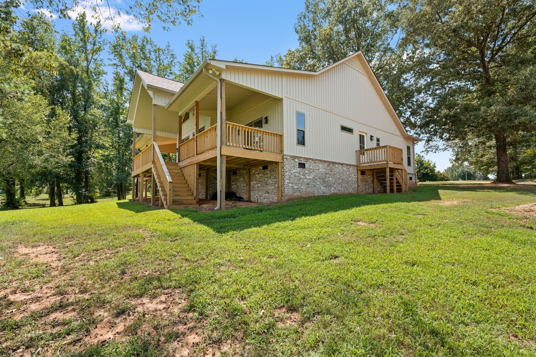 324 Fisherdale Drive Decaturville, TN 38329 - Photo 28 of 36 a view of a house with backyard and garden