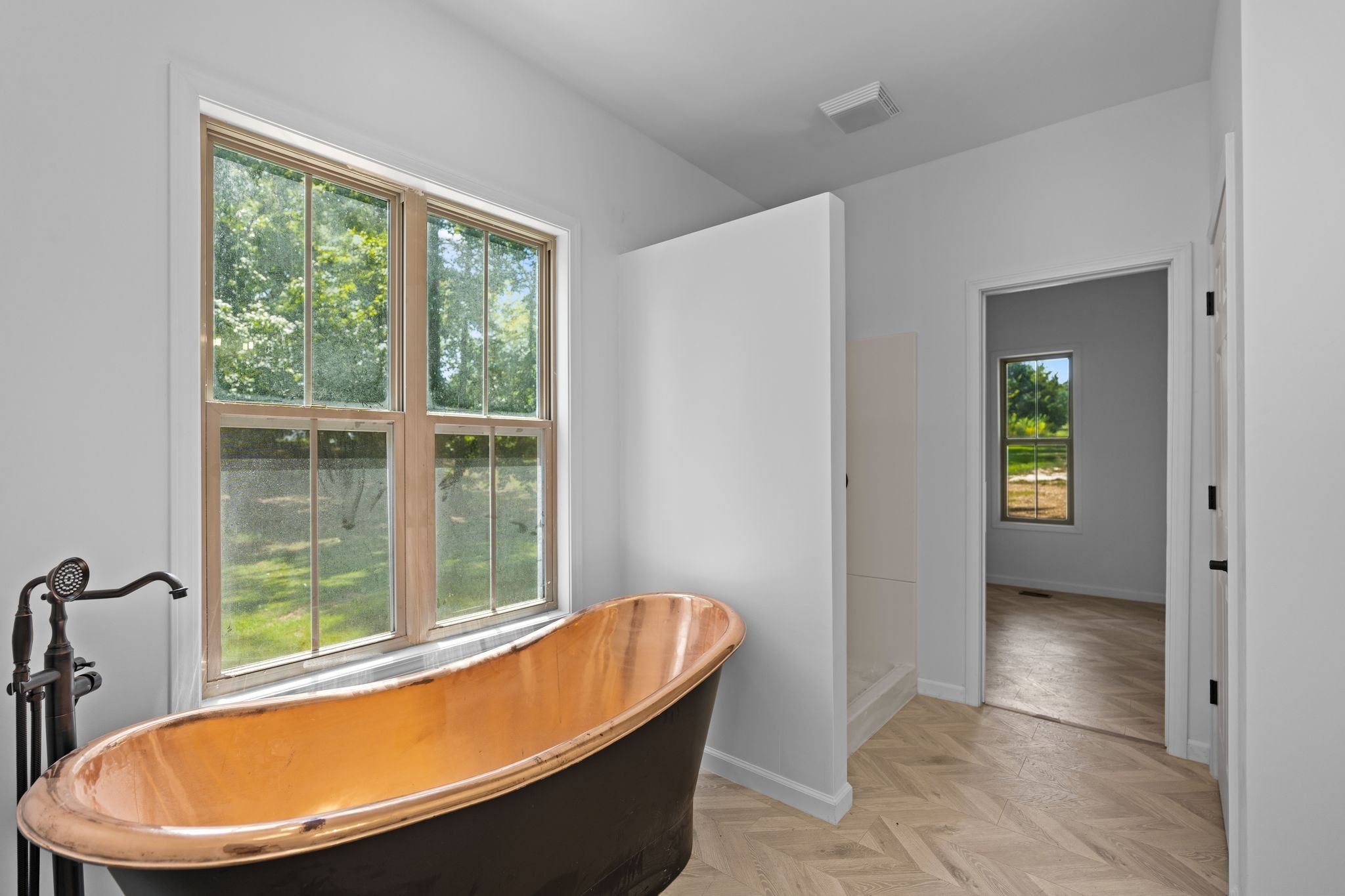 324 Fisherdale Drive Decaturville, TN 38329 - Photo 8 of 36 a view of a bathtub in a room