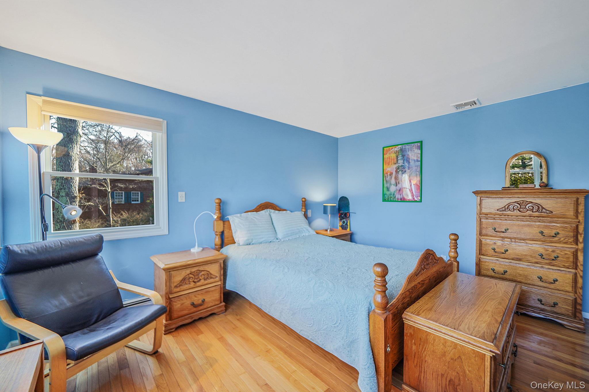 12 Harbor Beach Road Miller Place, NY 11764 - Photo 28 of 45 Bedroom with hardwood / wood-style floors