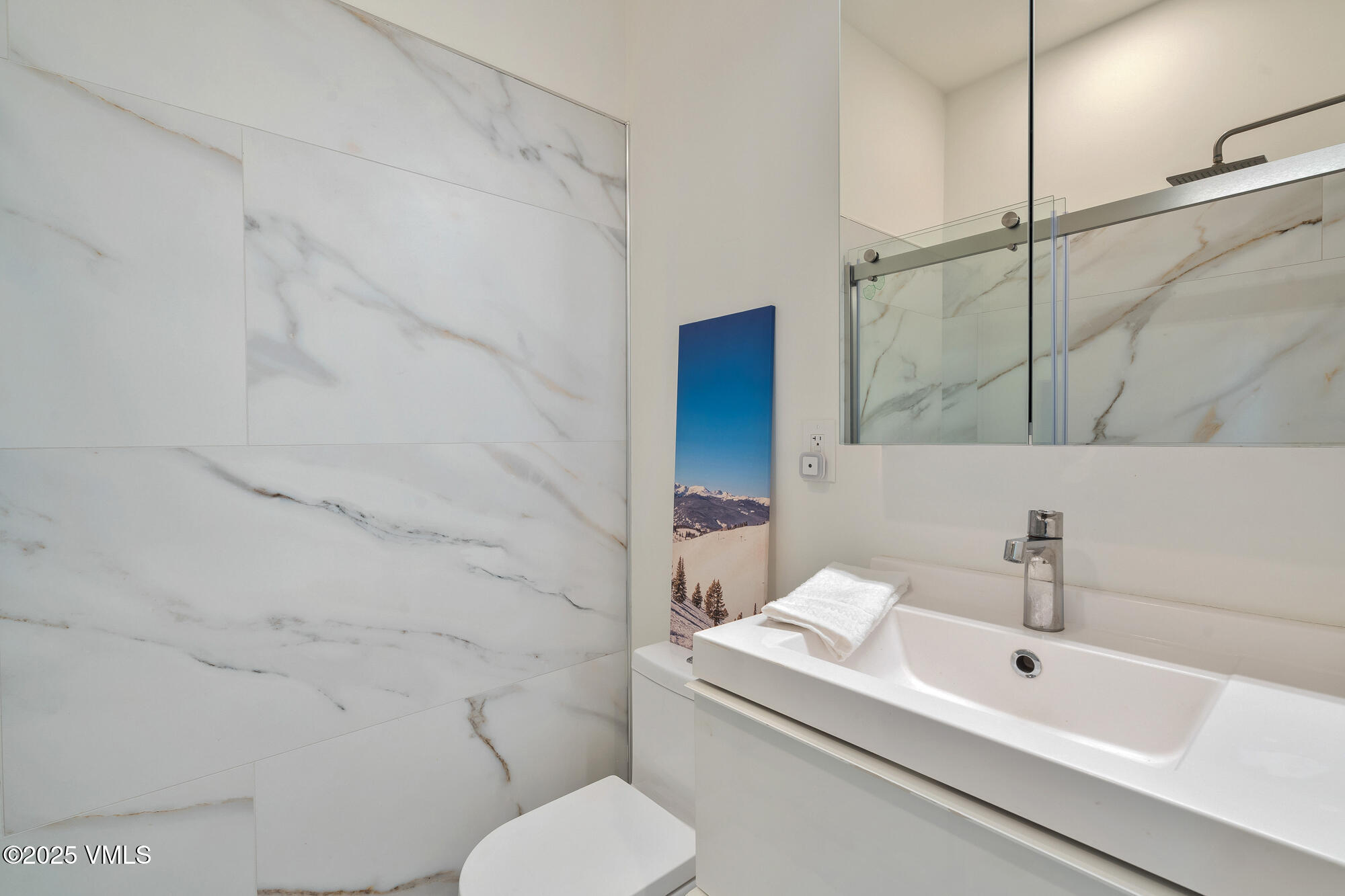 4545 Big Horn Road Vail, CO 81657 - Photo 34 of 49 a bathroom with a sink toilet and shower
