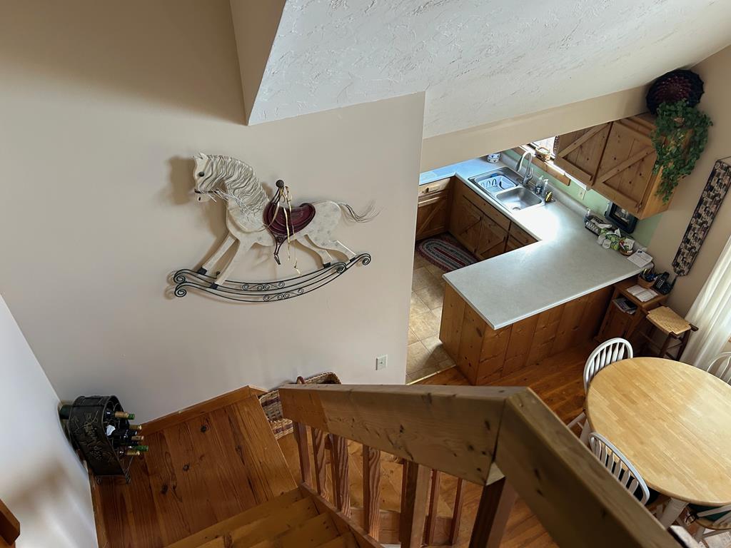 39 Thomas Ridge Lane Blairsville, GA 30512 - Photo 7 of 19 a bedroom with a bed and wooden floor