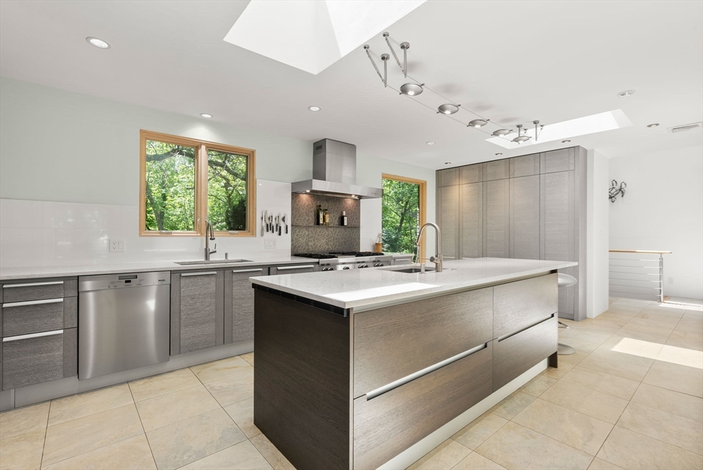 169 Hickory Road Weston, MA 02493 - Photo 11 of 30 a kitchen with a stove and a sink