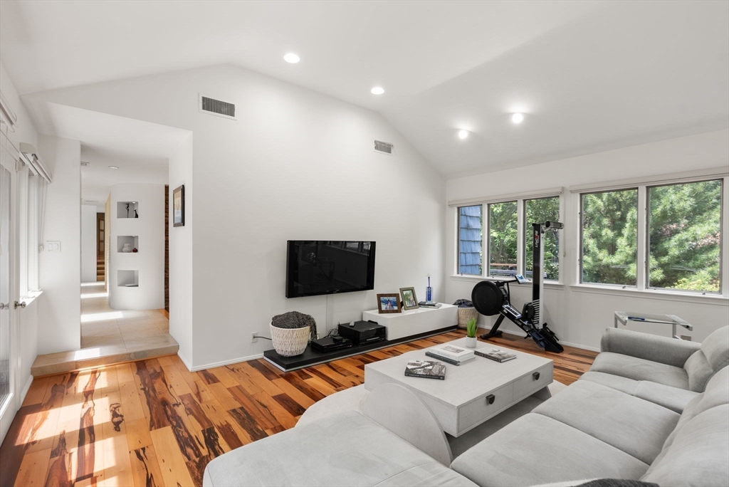 169 Hickory Road Weston, MA 02493 - Photo 14 of 30 a living room with furniture and a flat screen tv