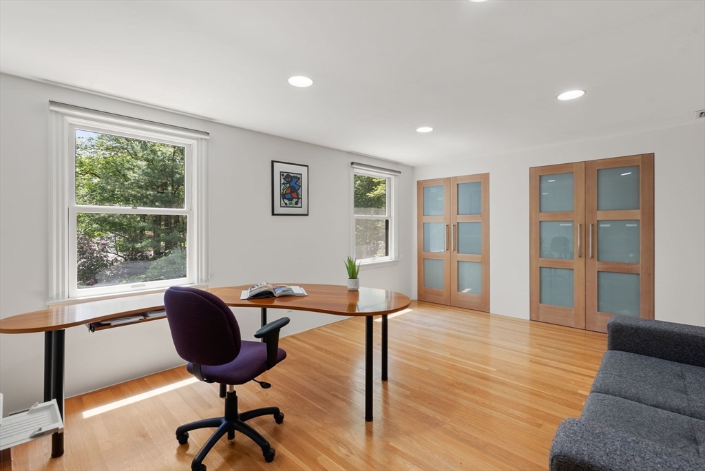 169 Hickory Road Weston, MA 02493 - Photo 25 of 30 a view of a livingroom with furniture and a workspace