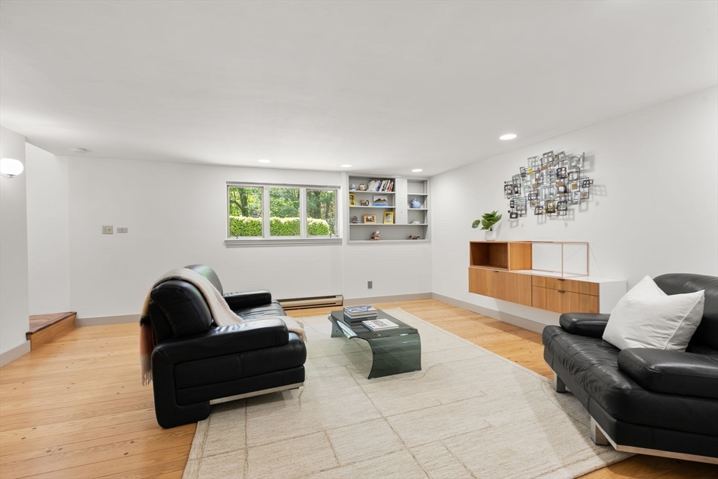 169 Hickory Road Weston, MA 02493 - Photo 26 of 30 a living room with furniture and a window