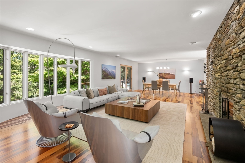 169 Hickory Road Weston, MA 02493 - Photo 6 of 30 a living room with furniture and a large window
