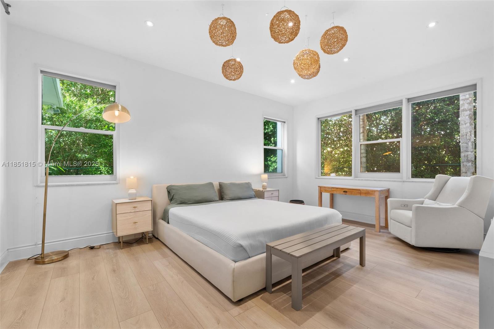 200 Ocean Ln Drive, Unit 108 Key Biscayne, FL 33149 - Photo 25 of 39 a bedroom with a bed and a large window