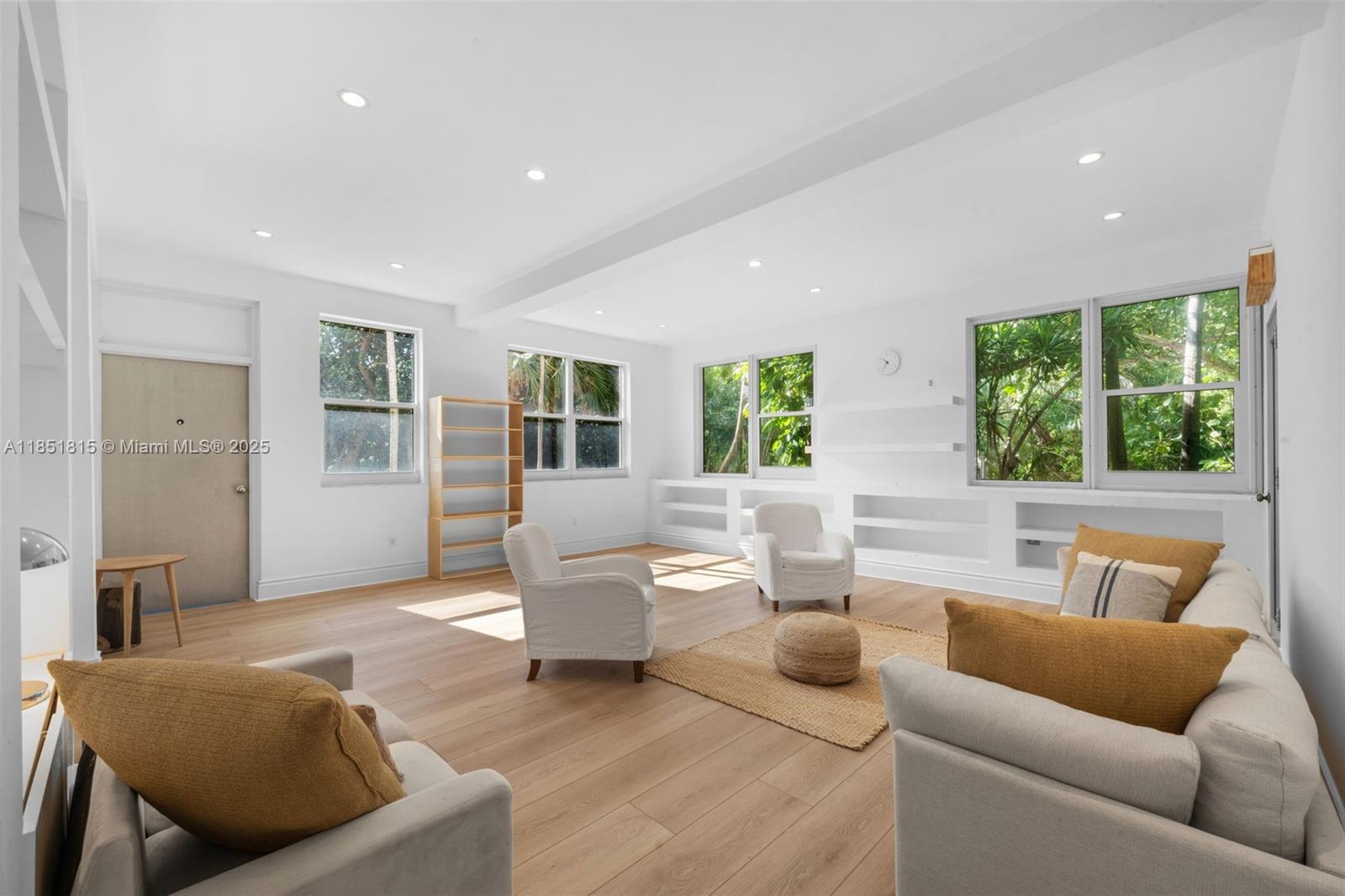 200 Ocean Ln Drive, Unit 108 Key Biscayne, FL 33149 - Photo 7 of 39 a living room with furniture and a large window
