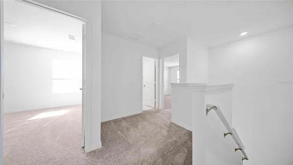 a view of a room that has a window in it
