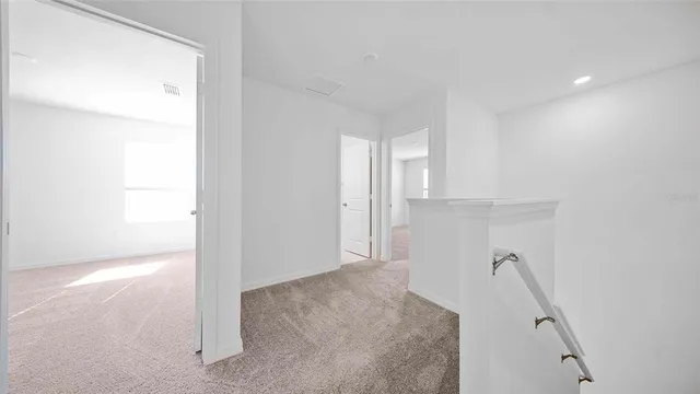 a view of a room that has a window in it