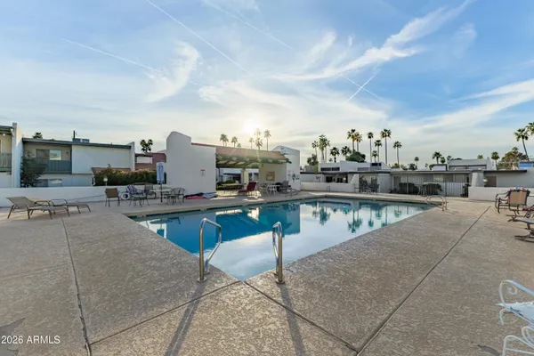 a picture of a bench in front of a window