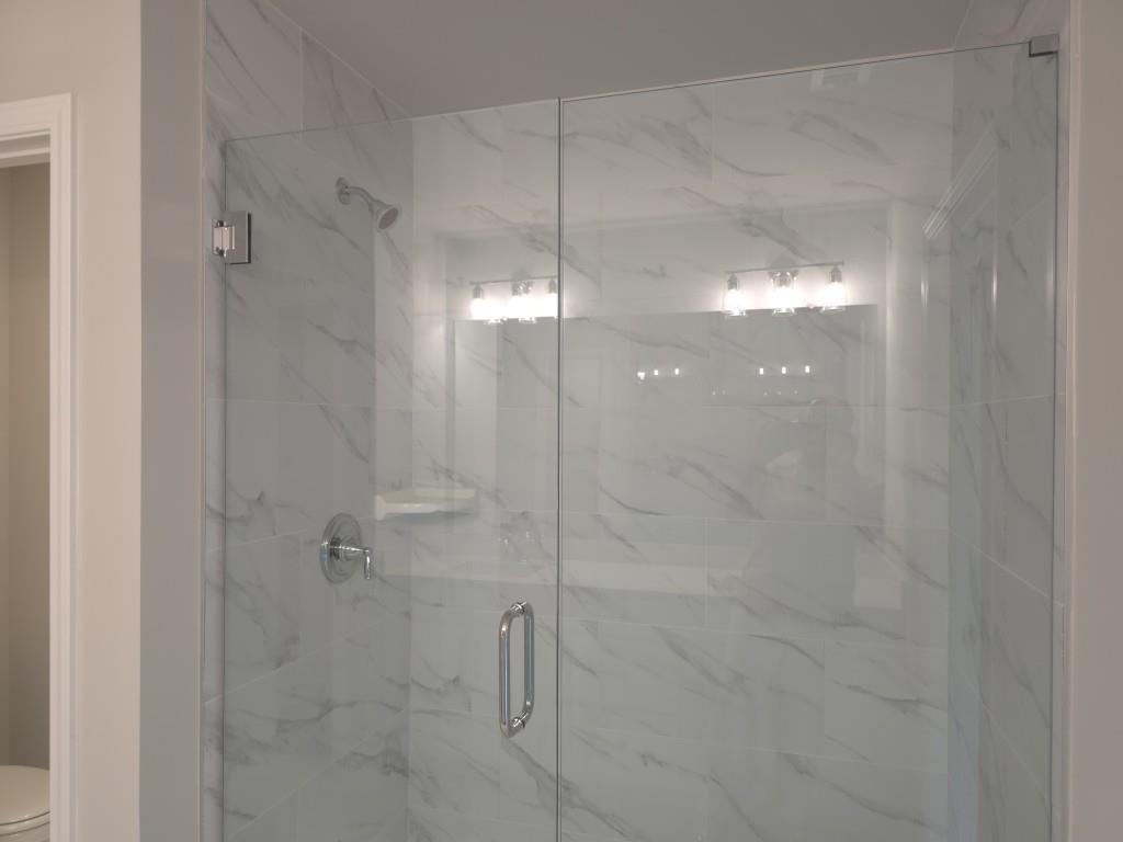 4240 Cavalier Way Duluth, GA 30097 - Photo 32 of 46 a bathroom with a shower