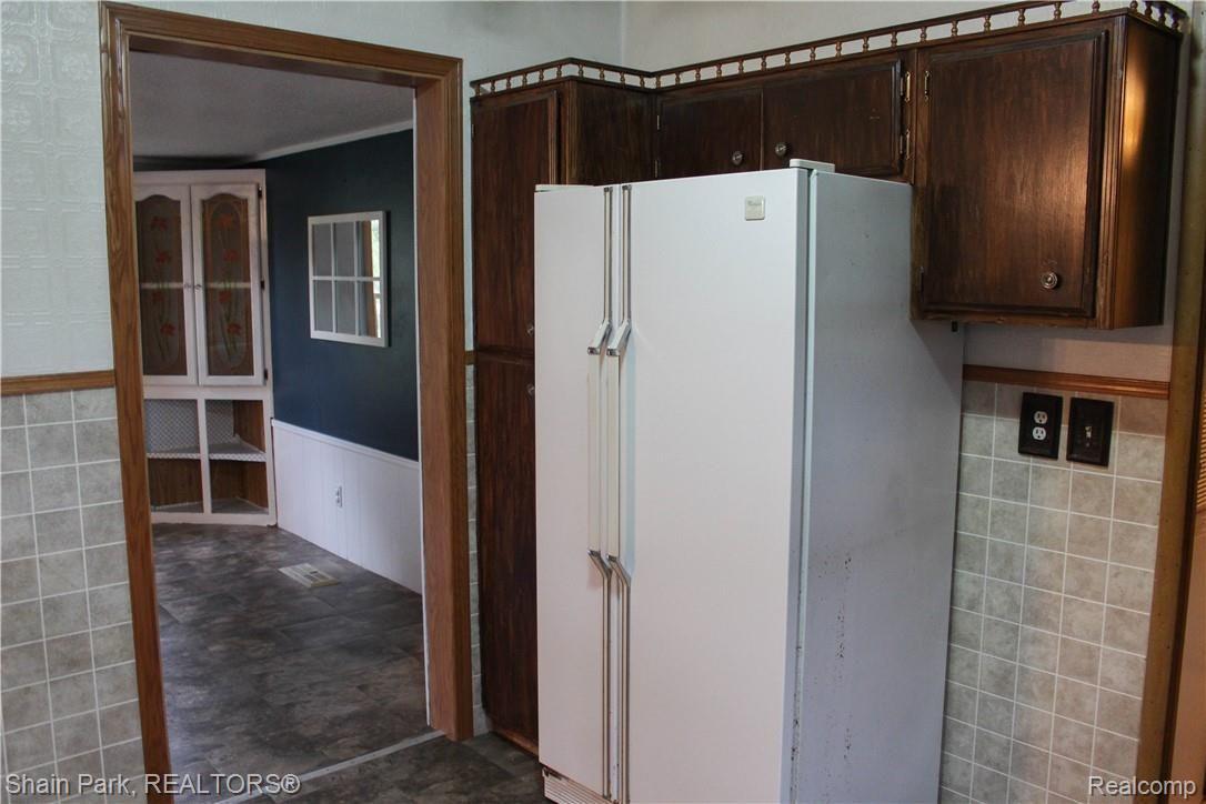 14676 Bryce Road Capac, MI 48014 - Photo 12 of 30 Great Flow from Kitchen into Dining Room