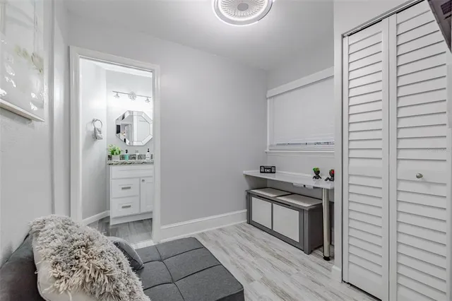 a kitchen with a stove and cabinets
