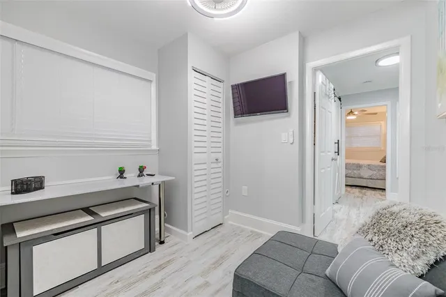 a living room with furniture and a gate