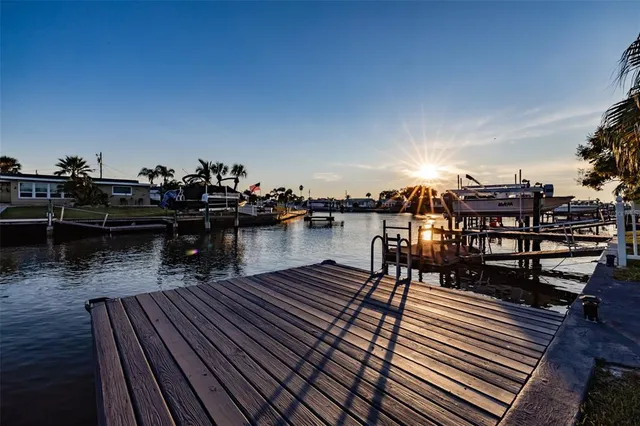 a view of a chairs on the roof deck
