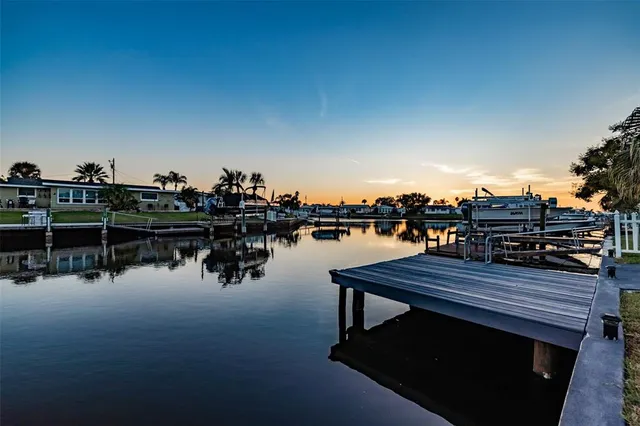 a view of a lake with sitting area
