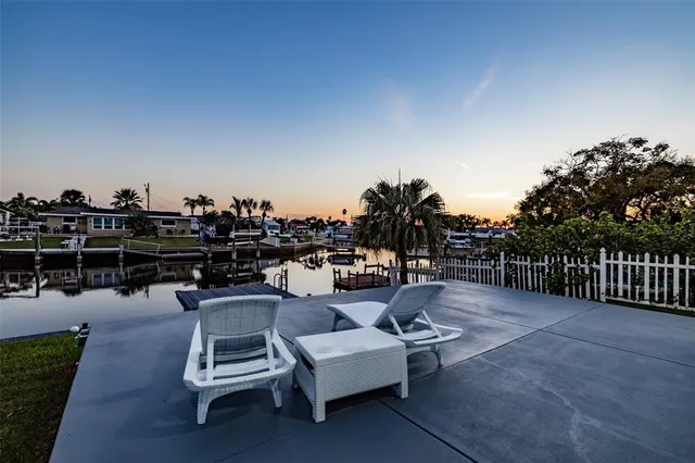 a view of a terrace with chairs