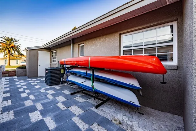a blue bench sitting in front of a building