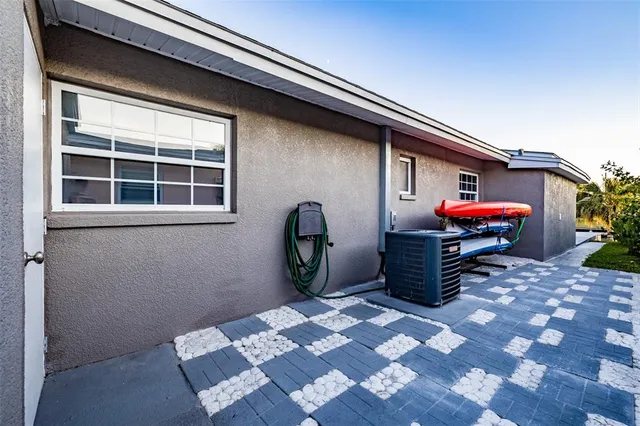 a backyard of a house with seating space