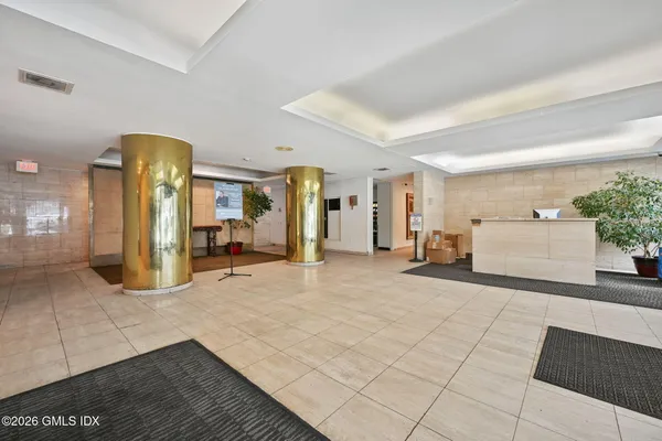 a view of a living room and entry way