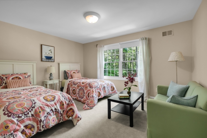33 St Nickolas Way Bernards, NJ 07920 - Photo 28 of 50 a bedroom with two beds and a couch