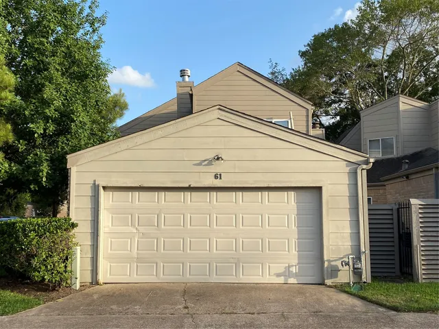 a white house with a outdoor space