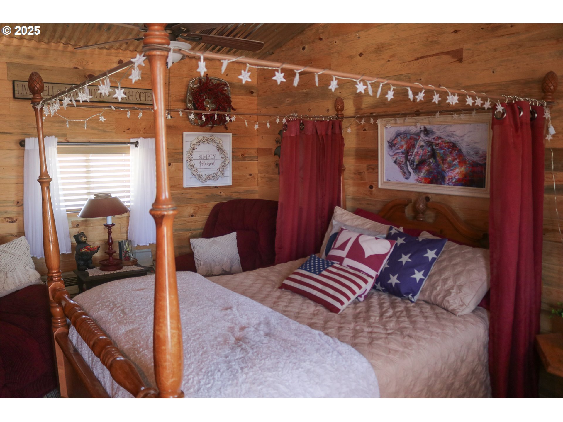 66410 Crane-Buchanan Road Burns, OR 97720 - Photo 12 of 37 a bedroom with a bed and wooden floor