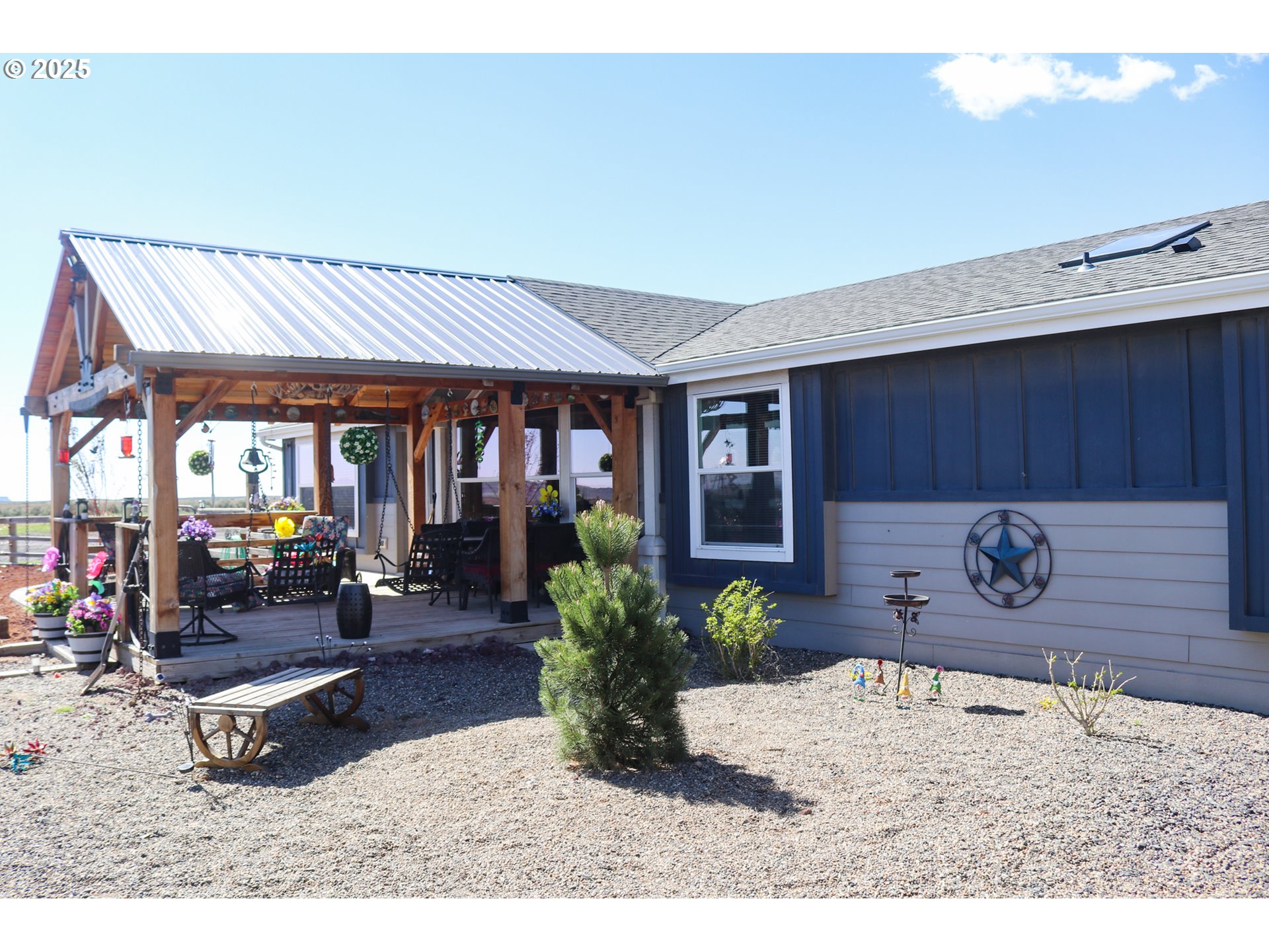 66410 Crane-Buchanan Road Burns, OR 97720 - Photo 2 of 37 a living room with furniture a window and potted plant