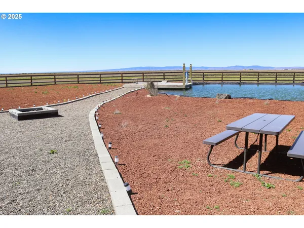 a view of a swimming pool and outdoor space
