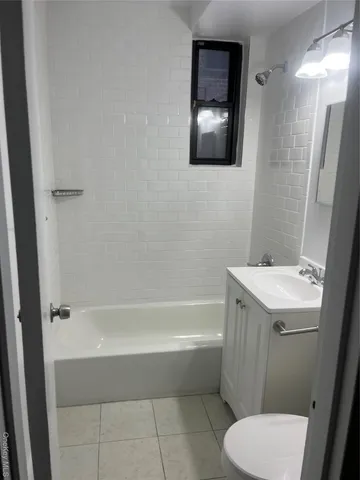 a view of a chairs and flower in a yard