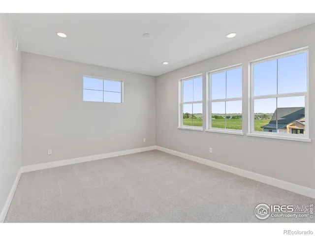 a kitchen with stainless steel appliances a stove top oven and cabinets