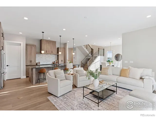 a spacious bathroom with a double vanity sink and a mirror