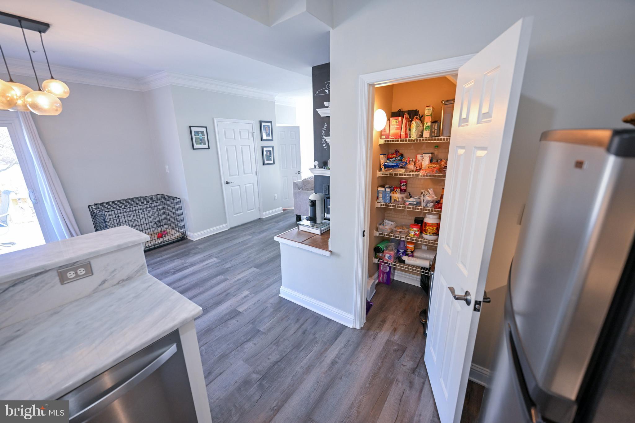 8727 Grape Arbor Way Odenton, MD 21113 - Photo 15 of 49 a view of living room with furniture and wooden floor