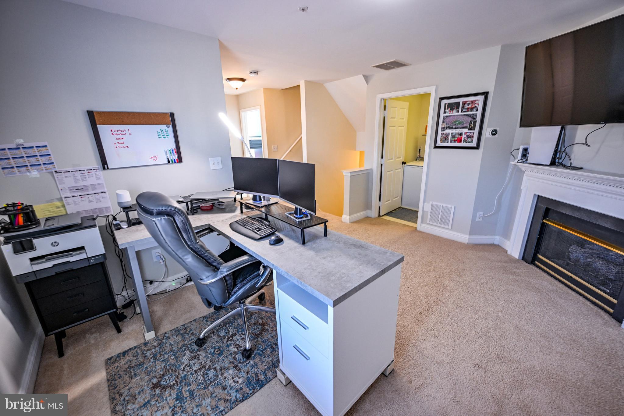 8727 Grape Arbor Way Odenton, MD 21113 - Photo 20 of 49 a room with furniture and a flat screen tv