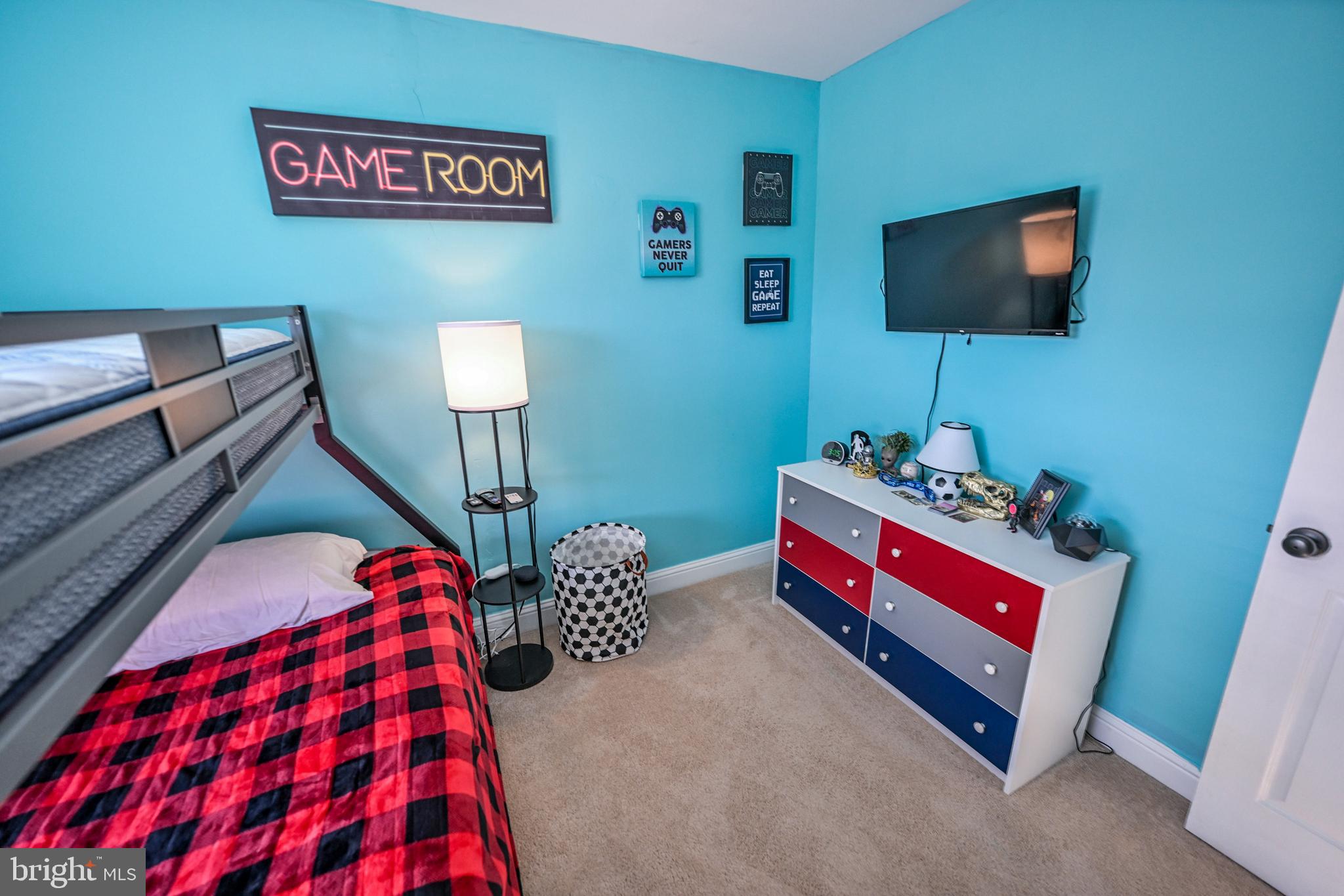 8727 Grape Arbor Way Odenton, MD 21113 - Photo 28 of 49 a bedroom with bed and a flat screen tv