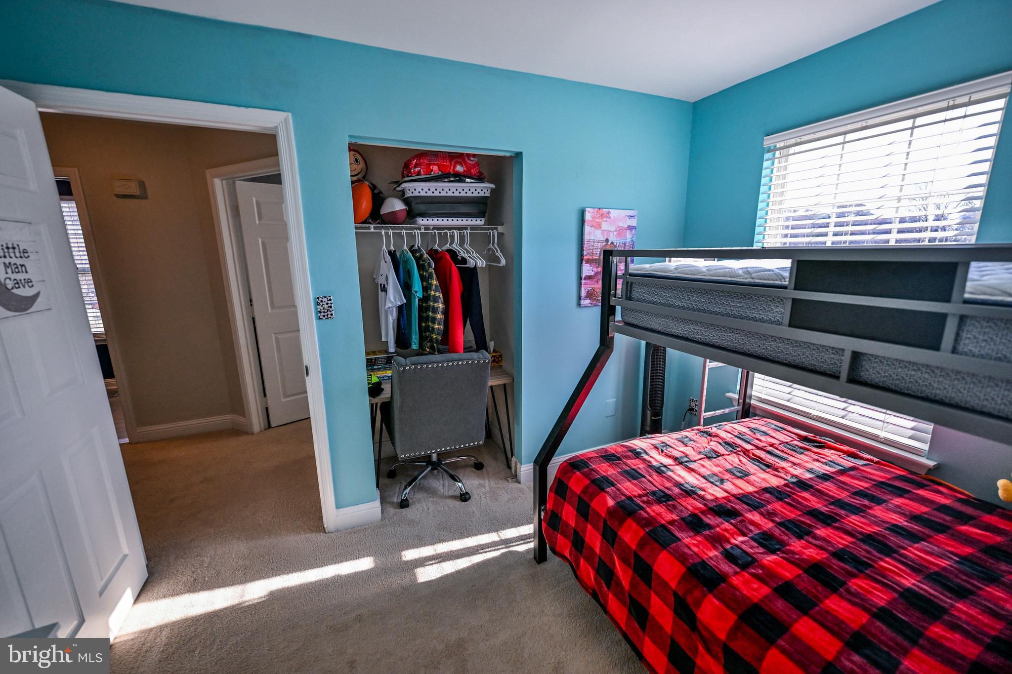 8727 Grape Arbor Way Odenton, MD 21113 - Photo 29 of 49 a bedroom with a bed and a window