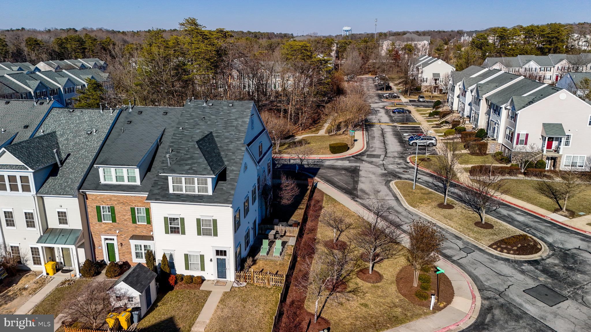 8727 Grape Arbor Way Odenton, MD 21113 - Photo 4 of 49 a view of a house with a swimming pool