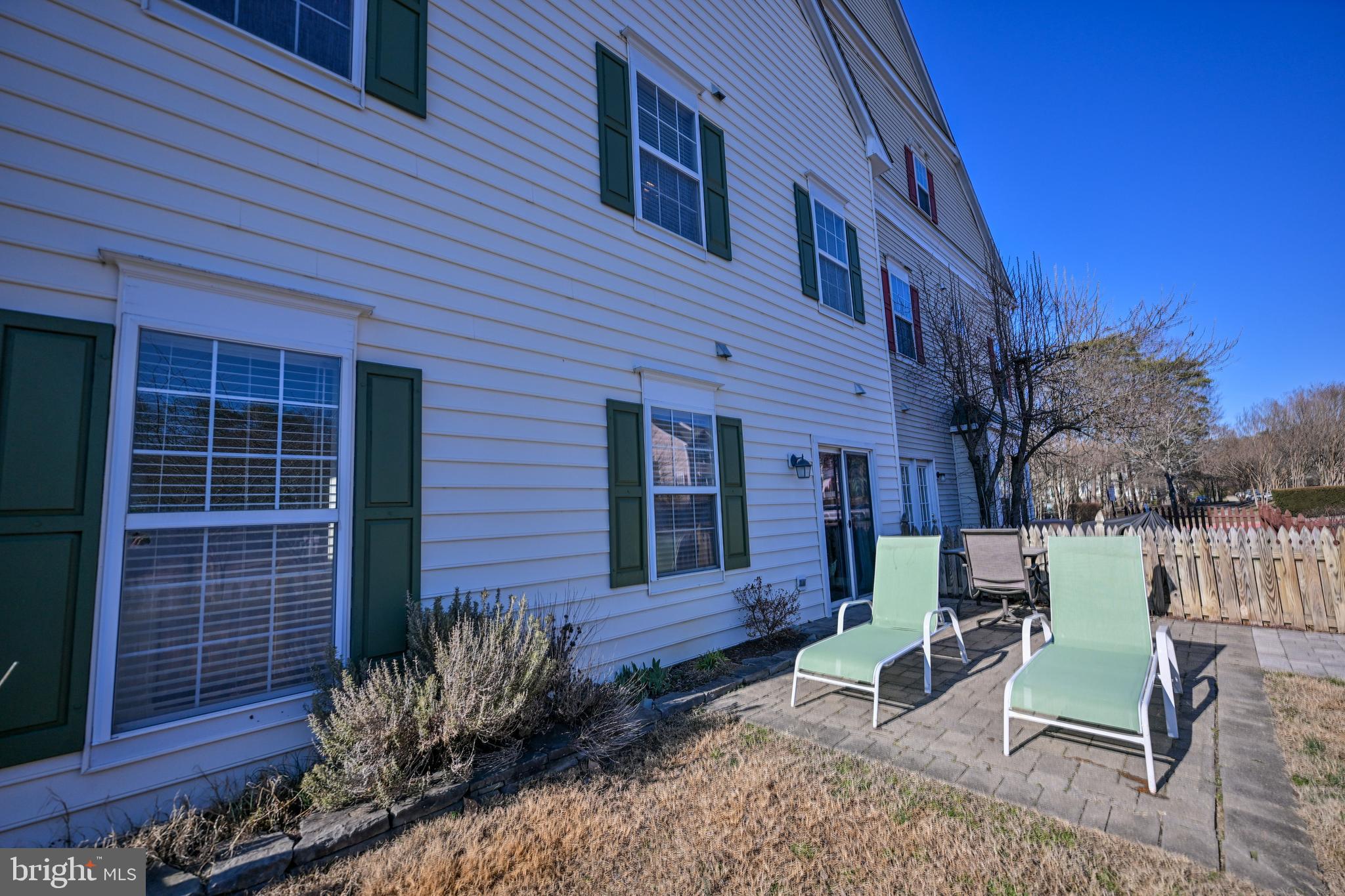 8727 Grape Arbor Way Odenton, MD 21113 - Photo 44 of 49 a view of a house with a patio