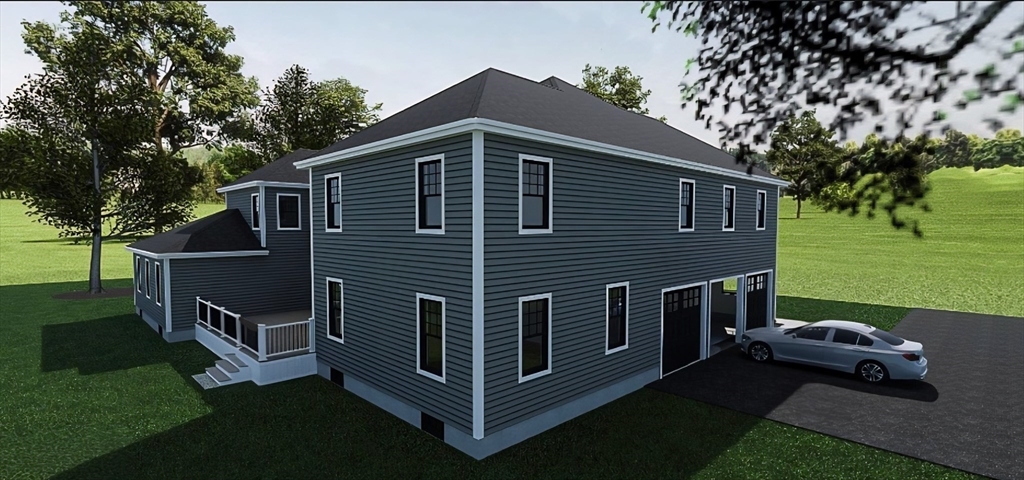 98 Horseneck Road Dartmouth, MA 02748 - Photo 6 of 8 a backyard of a house with lots of green space and outdoor seating