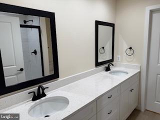 58 South Glebe Road Montross, VA 22520 - Photo 11 of 25 a bathroom with a sink and a mirror