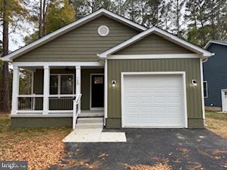 58 South Glebe Road Montross, VA 22520 - Photo 19 of 25 a front view of a house with a yard