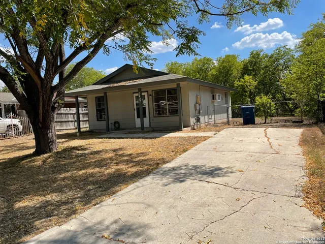 a house with trees in front of it