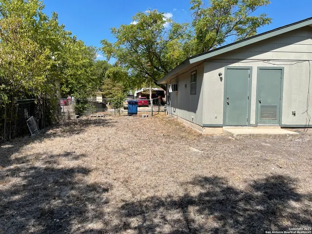 a view of a house with a garage