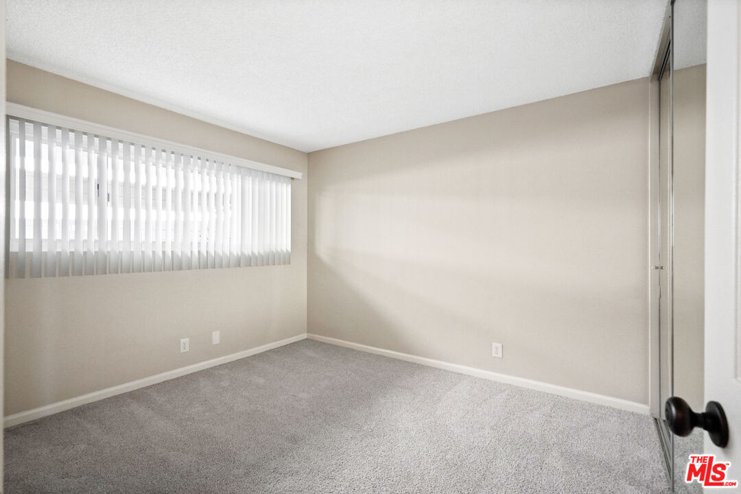 18000 Coastline Drive, Unit 8 Malibu, CA 90265 - Photo 18 of 26 an empty room with windows