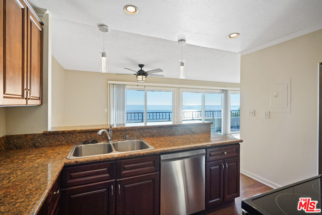 18000 Coastline Drive, Unit 8 Malibu, CA 90265 - Photo 9 of 26 a kitchen with a sink and a window