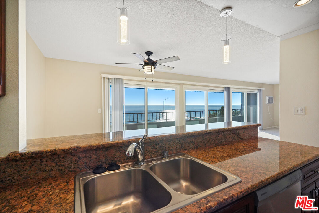 18000 Coastline Drive, Unit 8 Malibu, CA 90265 - Photo 10 of 26 a kitchen with a sink and a window