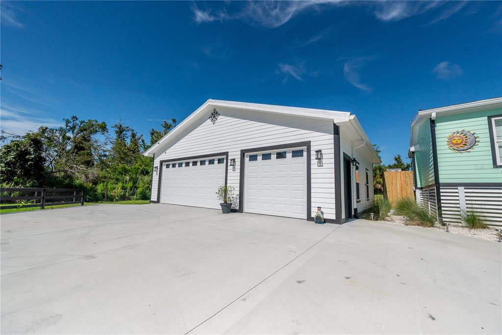 1175 Southwest 248th Avenue Steinhatchee, FL 32359 - Photo 12 of 54 a view of garage with a small yard