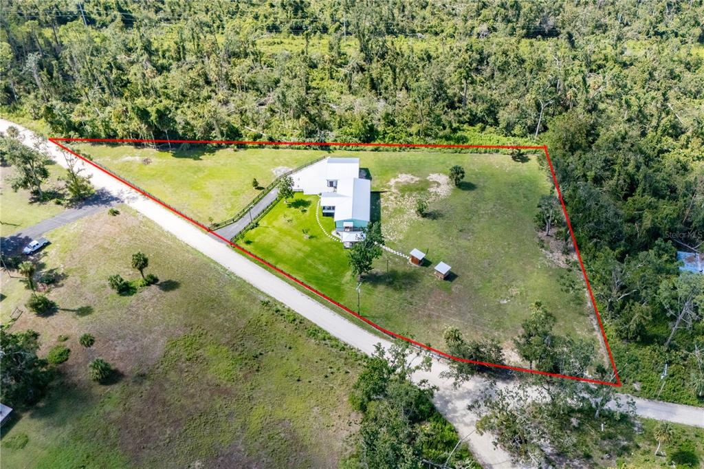 1175 Southwest 248th Avenue Steinhatchee, FL 32359 - Photo 23 of 54 an aerial view of a yard with a yard