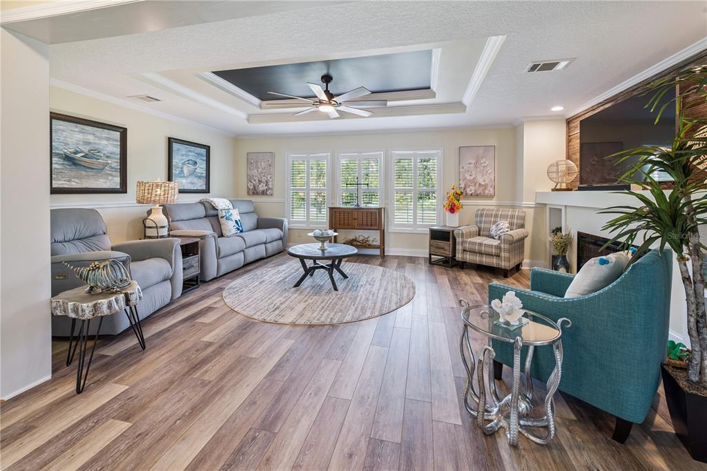 1175 Southwest 248th Avenue Steinhatchee, FL 32359 - Photo 25 of 54 a living room with furniture fireplace and a large window